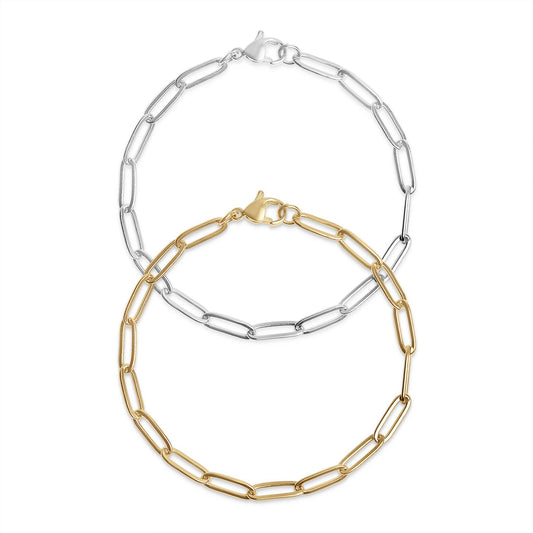 Two chain necklaces, one gold and one silver, on a white background.