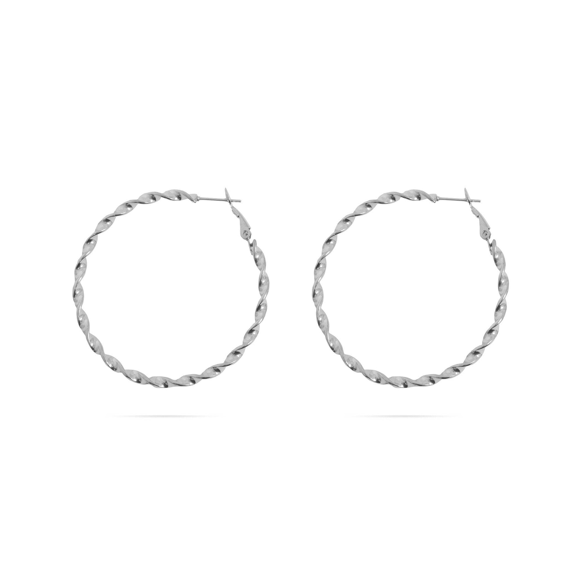 Pair of silver hoop earrings on a white background
