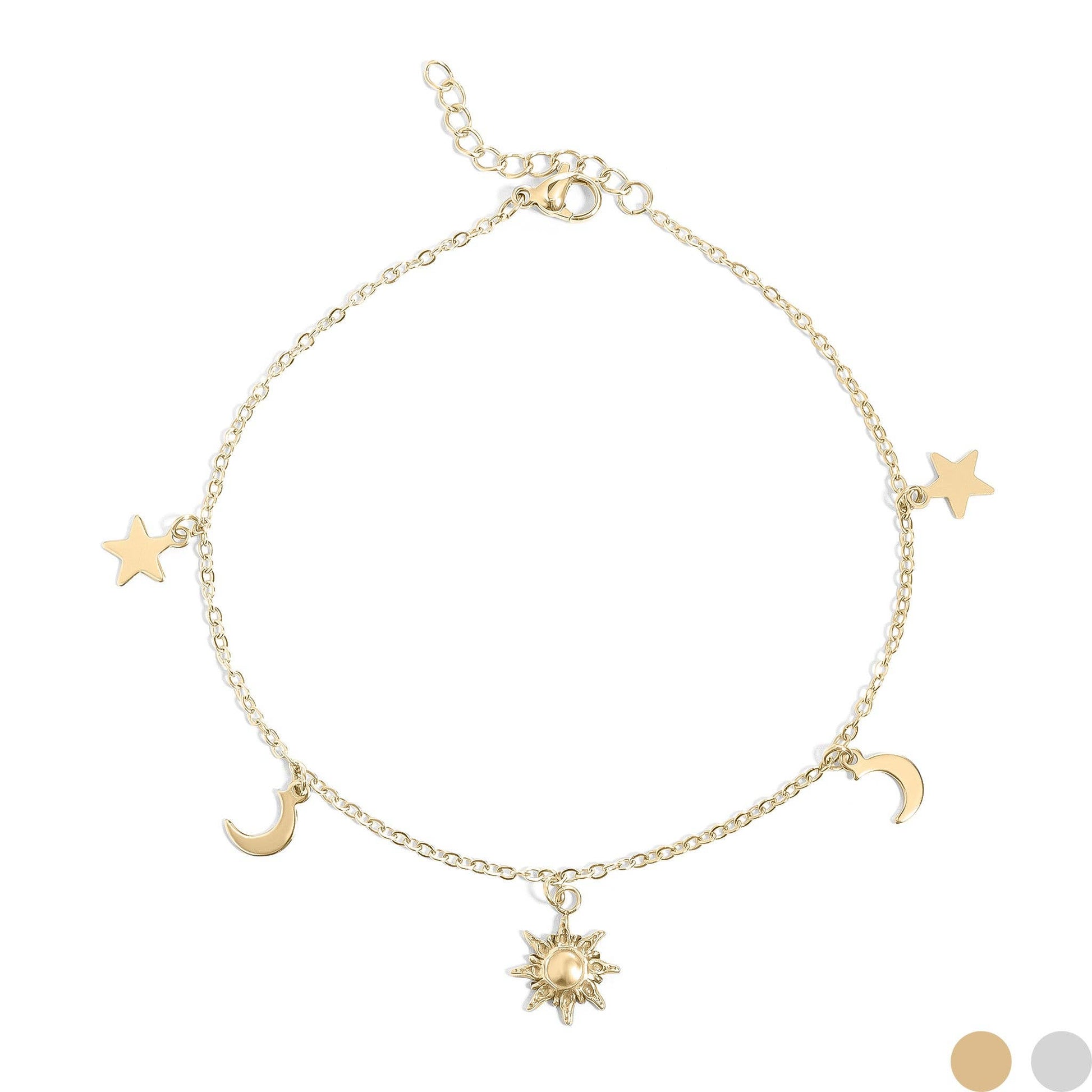 Gold bracelet with star, moon, and sun charms on a white background